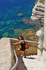 Descending the stairs carved in the cliffs of Bonifacio