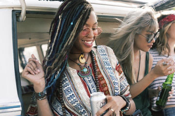Friends Drinking Alcohol Beers Together on Road Trip Journey