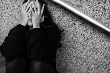 Adult Woman Sitting Look Worried on The Stairway