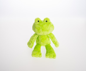 toy or frog soft toy on the background.