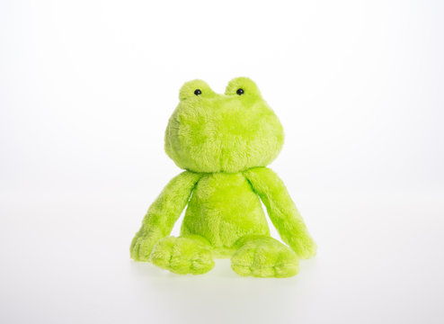 toy or frog soft toy on the background.