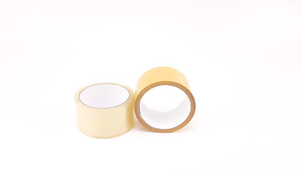 Thick transparent plastic tape and brown plastic tape in white big core