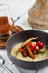 Mushroom Soup with Garlic and Cherry Tomato