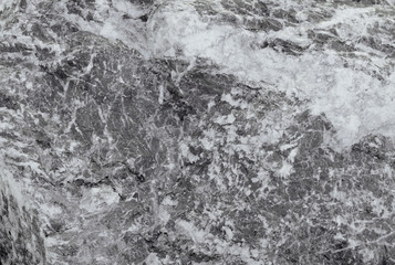 Fototapeta na wymiar Close up of texture on nature rock. Gray texture of nature stone.