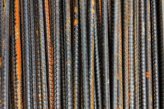 Thick rusty rebar rods metallic