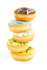 Donut with sprinkles isolated on white background, studio shoot