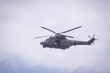 Fototapeta na wymiar A SA 330 Puma helicopter takes part at a NATO military exercise, on 18 March 2017, in Capu Midia, Romania.