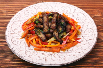 Fried chopped beef with stewed vegetables