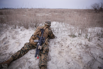 Soldiers from US Navy Amphibious Squadron 8 assault an enemy strong point during a NATO military exercise