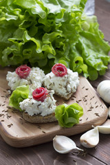Cream cheese sandwiches with salami and salad leaves,healthy food.