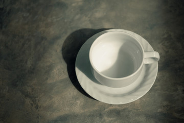abstract vintage of coffee cup on the floor