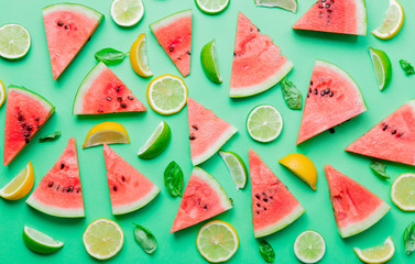cutted lemons and limes with watermelon © Masson