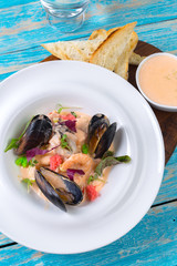 Tasty seafood on plate on table close-up
