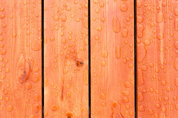 Water drops on wooden background pattern with vertical lines