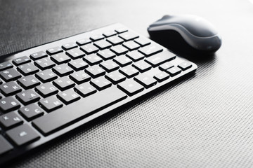 keyboard and mouse on the table .