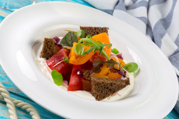 Fresh vegetable salad on wooden background