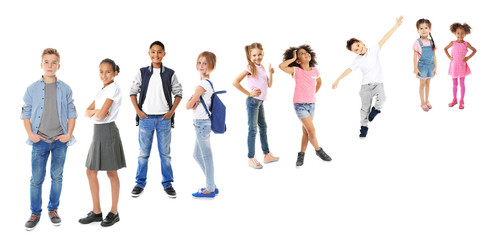Schoolchildren of different ages on white background