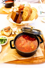 Russian or Ukrainian borscht with a cast iron pot.