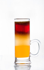 Shot against the light. Cocktail on white background