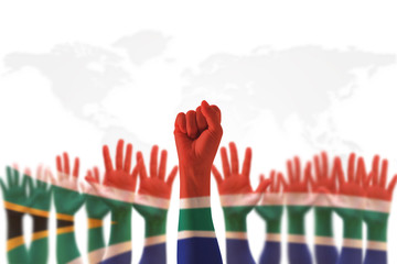South Africa national flag on leader's fist hands (clipping path) for human rights, leadership,...