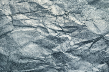Crumpled silver paper, background