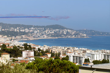 NICE - JULY 14, 2017 :  France commemorates Bastille Day attack in Nice. French Acrobatic Patrol over the city.