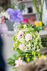 Obraz na płótnie Canvas close-up view of beautiful floral bouquet in flower shop