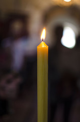 Lit candle in Orthodox Monastery