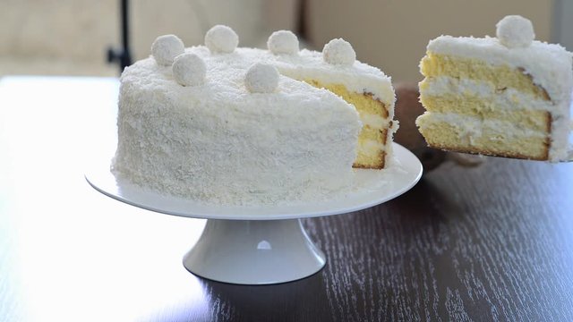 Woman hand take piece of cake. Dessert background.