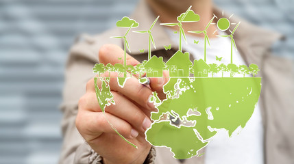 Businessman drawing renewable energy sketch