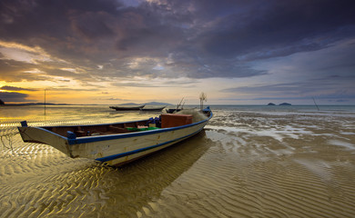 Fototapeta premium the boat during wonderful sunset at pandak beach,kuching sarawak on 6 march 2017