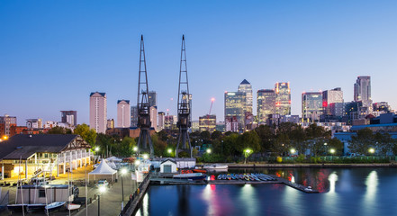 London's Canary Wharf district viewed from Mellville Dock at dusk. 