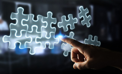 Businesswoman touching hand-drawn puzzle pieces