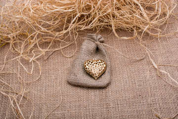 Heart shaped gold color metal object