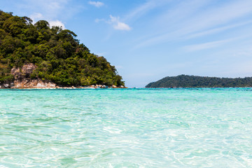 Tropical beach, traditional long tail boats, Andaman Sea, Thailand.
