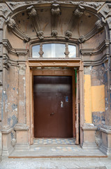 Front door in old building on Bolshoy Kazachiy pereulok, St. Petersburg, Russia