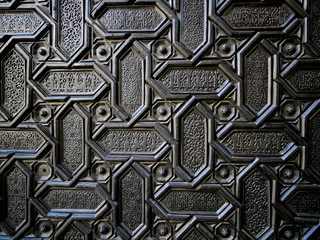 Close-up part of a gate at Seville Cathedral in Seville, Spain.