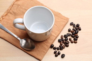 empty white coffee cup on wood background