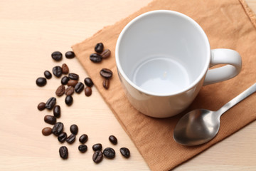 empty white coffee cup on wood background