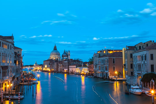 Basilica Santa Maria della Salute, Punta della Dogona  and Grand Canal at blue hour, Venice, Veneto, Italy viewed from Accademia Bridge , a popular tourist attraction