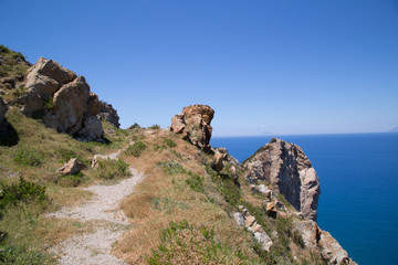 Naturalistic Trail Calavà, spring, on the horizon the Filicudi Island