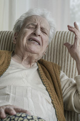 sad senior woman complaining something