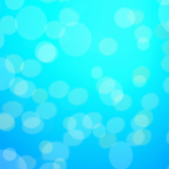 Abstract blue background with defocused bokeh, blur texture with copy space, poster for your design..