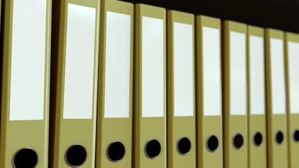 Yellow office binders. 3D rendering
