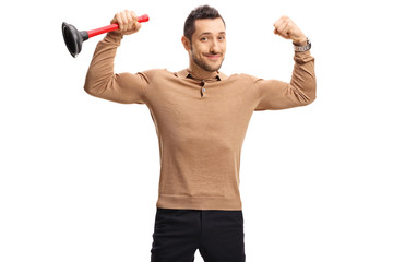 Young man with a plunger flexing his biceps