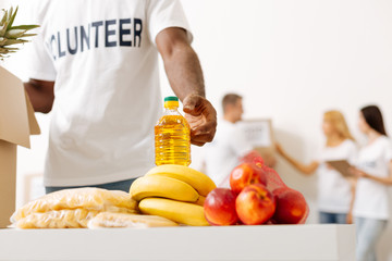 Generous motivated man providing help for the poor