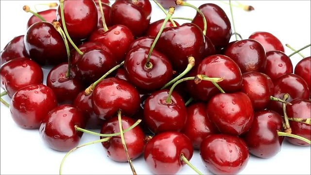 red juicy cherries rotating, fresh ripe fruit
 
