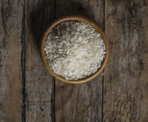 Raw white rice in a bowl 