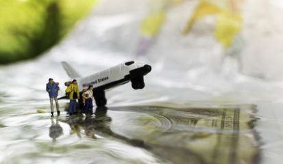Backpacker stay beside the airplane for travel concept.