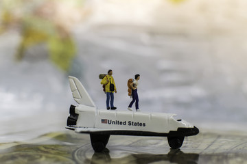 Backpacker stay on the airplane for travel concept.